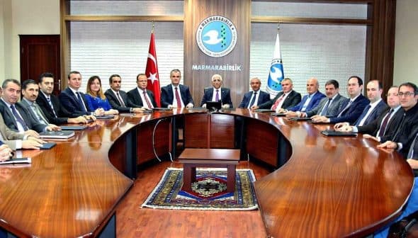 Group of individuals seated around a large conference table during a meeting at Marmarabirlik. - Olive Oil Times