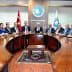Group of individuals seated around a large conference table during a meeting at Marmarabirlik. - Olive Oil Times