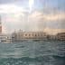 Scenic view of Venice's architecture from a vaporetto on the water. - Olive Oil Times