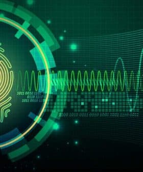 A digital fingerprint graphic surrounded by a circular design and waveform patterns. - Olive Oil Times