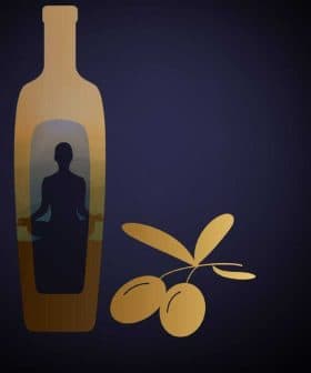 Illustration of an olive oil bottle with a silhouette inside and olive branches beside it. - Olive Oil Times