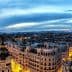 Panoramic view of Madrid's skyline featuring buildings and a twilight sky. - Olive Oil Times