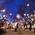 City square with illuminated trees and light decorations during nighttime. - Olive Oil Times