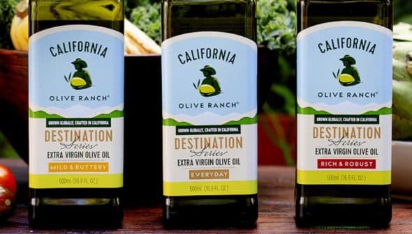 Three bottles of California Olive Ranch extra virgin olive oil with different labels: Mild & Buttery, Everyday, Rich & Robust. - Olive Oil Times