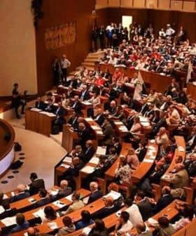 Interior view of a conference hall filled with attendees during an Italia Olivicola event. - Olive Oil Times