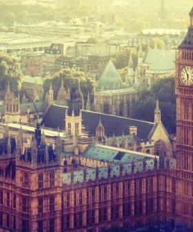 Aerial view of the Houses of Parliament and Big Ben in London during daylight. - Olive Oil Times