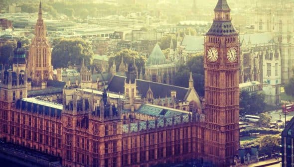 Aerial view of the Houses of Parliament and Big Ben in London during daylight. - Olive Oil Times