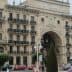 Facade of the Banco Santander building featuring ornate architectural details and balconies. - Olive Oil Times