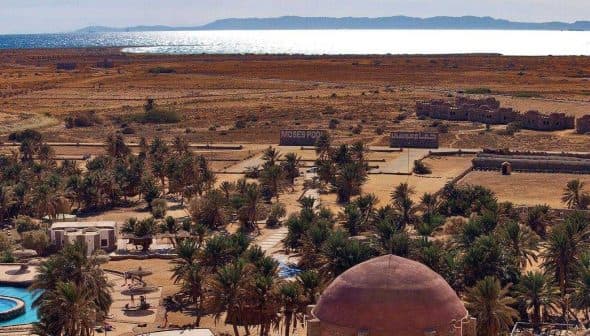Aerial view of El Tur on the Sinai Peninsula featuring desert landscape and palm trees. - Olive Oil Times