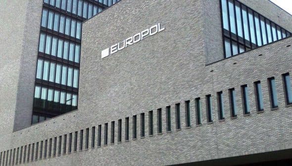 Exterior view of the Europol headquarters building featuring a modern architectural design. - Olive Oil Times