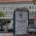 Entrance gate of the World Trade Organization headquarters in Geneva, Switzerland. - Olive Oil Times