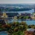 Aerial view of Stockholm showcasing the cityscape, waterways, and greenery in the foreground. - Olive Oil Times