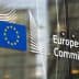 European Commission logo displayed on a glass wall with the EU flag and emblem. - Olive Oil Times