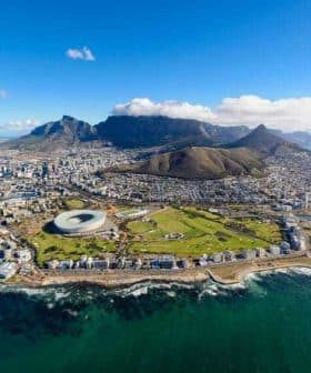 Aerial view of Cape Town featuring Table Mountain and the surrounding coastline. - Olive Oil Times