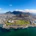 Aerial view of Cape Town featuring Table Mountain and the surrounding coastline. - Olive Oil Times