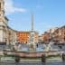 Fountain with sculptures and an obelisk in the center of Piazza Navona in Rome. - Olive Oil Times