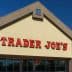 Exterior view of a Trader Joe's store with a prominent sign displaying the store name. - Olive Oil Times