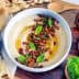 Olive Oil Hummus with Lamb Sausage, Mint & Pomegranate
