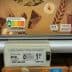 Nutri-Score label displayed on food packaging in a supermarket aisle. - Olive Oil Times