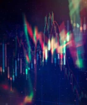 Abstract representation of a financial chart with colorful candlestick patterns and data lines. - Olive Oil Times