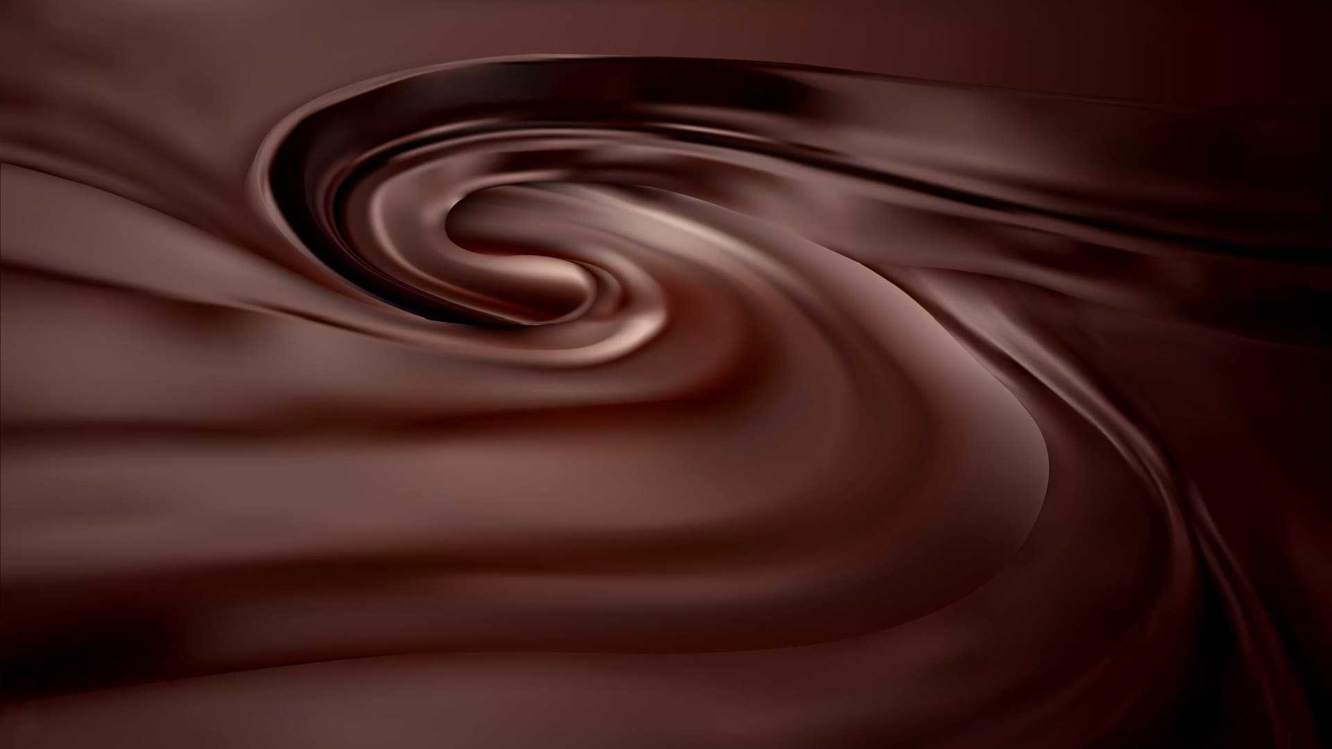 Smooth, swirling texture of dark chocolate with a glossy finish. - Olive Oil Times