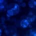 Abstract blue bokeh background with circular shapes and varying sizes. - Olive Oil Times
