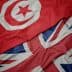 Close-up of the flags of Tunisia and the United Kingdom laid out together. - Olive Oil Times
