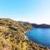 Coastal view of Monte Argentario in South Tuscany, featuring hills and the sea. - Olive Oil Times