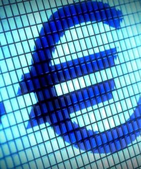 Close-up view of the Euro symbol displayed on a digital screen with a pixelated effect. - Olive Oil Times