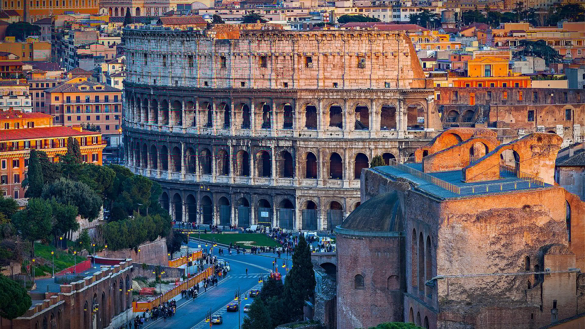 The Colosseum in Rome, an ancient amphitheater, viewed from an elevated perspective during sunset. - Olive Oil Times