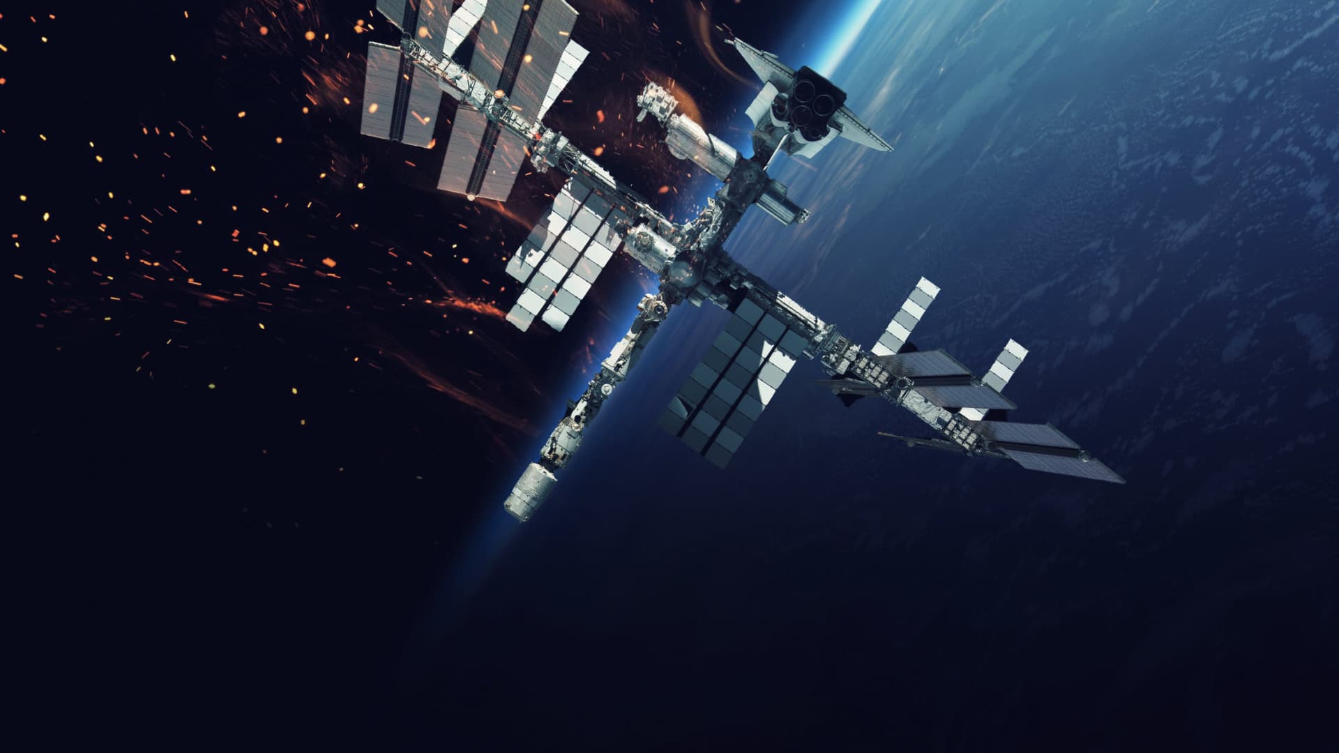 The International Space Station (ISS) orbiting Earth with solar panels extended. - Olive Oil Times