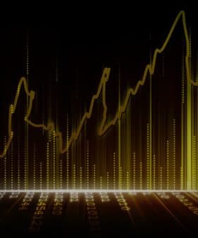 Line graph with upward trends displayed in yellow against a dark background. - Olive Oil Times