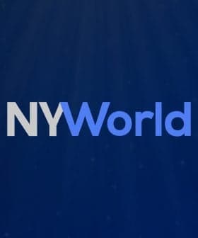Logo design for NYWorld 2023 featuring stylized text on a blue background. - Olive Oil Times