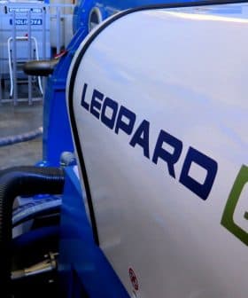 Close-up view of a Leopard 6 industrial machine with a blue and white design. - Olive Oil Times