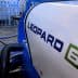 Close-up view of a Leopard 6 industrial machine with a blue and white design. - Olive Oil Times