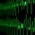 Digital representation of sound waves displayed in green on a dark background. - Olive Oil Times