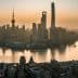 Aerial view of Shanghai's skyline with skyscrapers along the Huangpu River during sunset. - Olive Oil Times