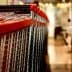 A row of shopping carts with red handles lined up in a retail environment. - Olive Oil Times
