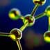 Close-up view of a molecular structure featuring green and yellow atoms connected by bonds. - Olive Oil Times