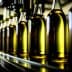 Bottles of olive oil in a factory assembly line